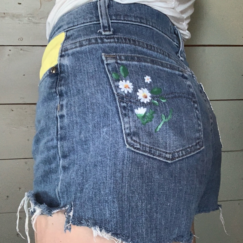 Hand painted cut off jean shorts